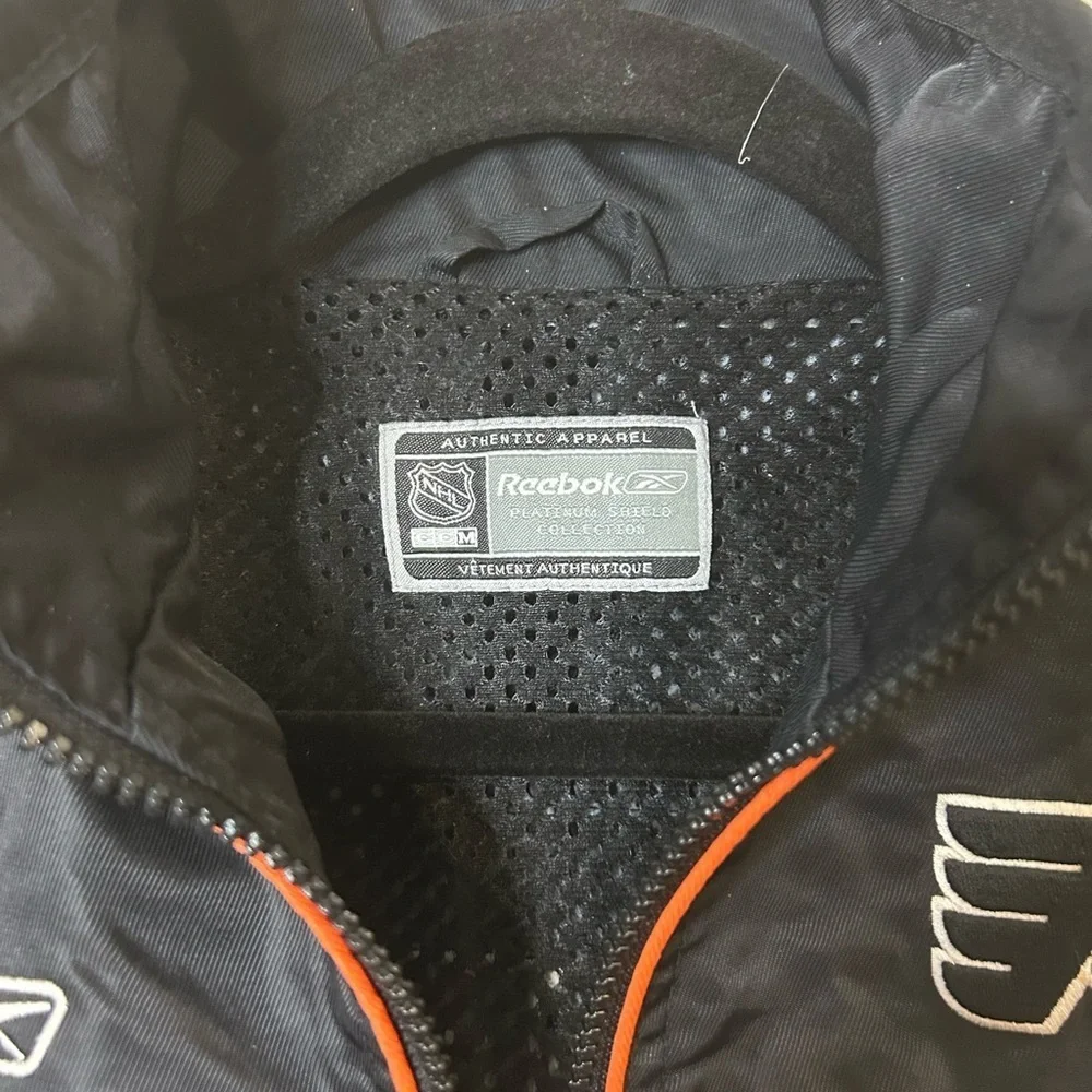 Reebok NHL Philadelphia Flyers Boys Full Zip Jacket, size Medium (10-12).